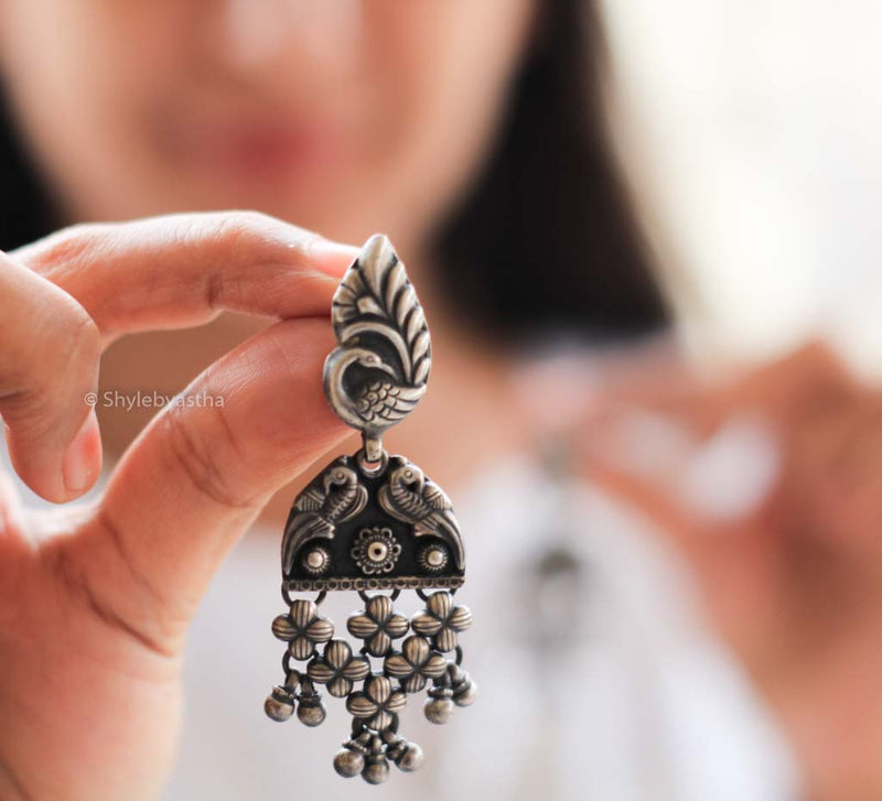 Mizoya Intricate Peacock Jali Earrings model