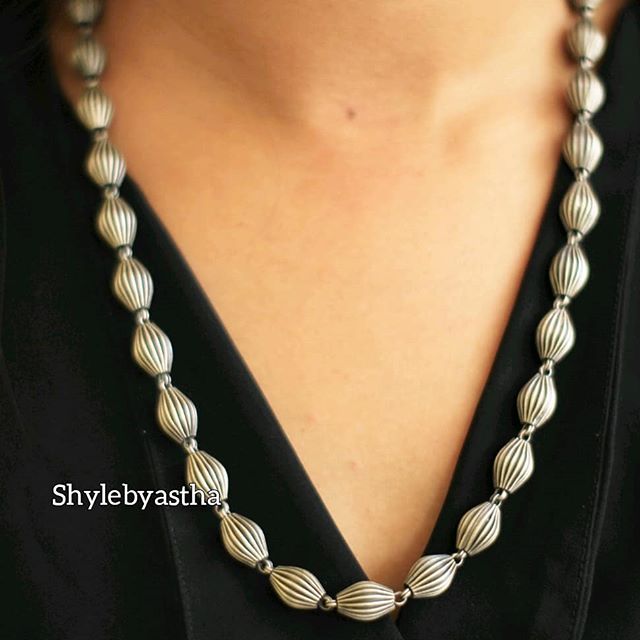 Adya Dholak Embossed Mala