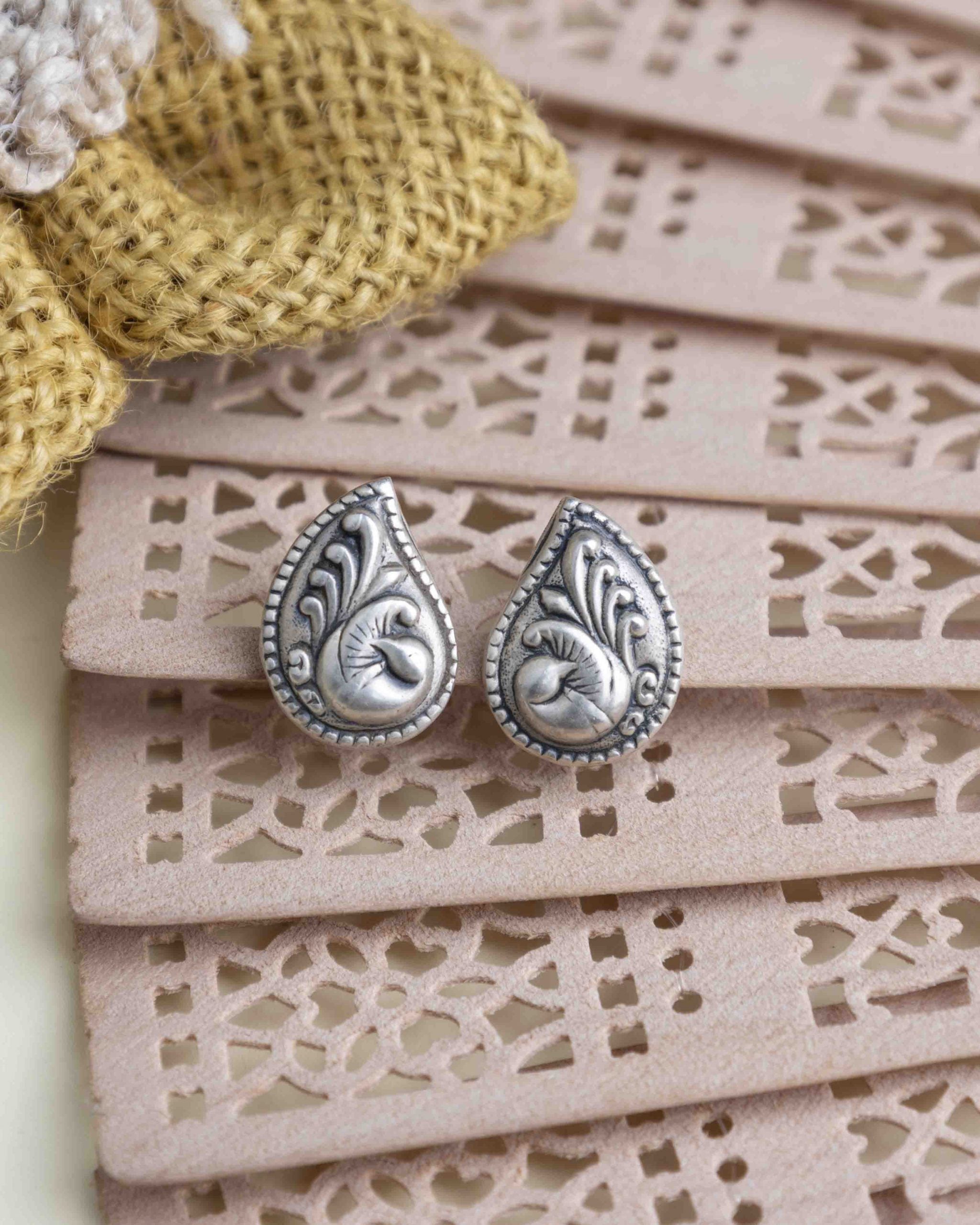 Adya Carry Motif Peacock Embossed Versatile Stud Earring