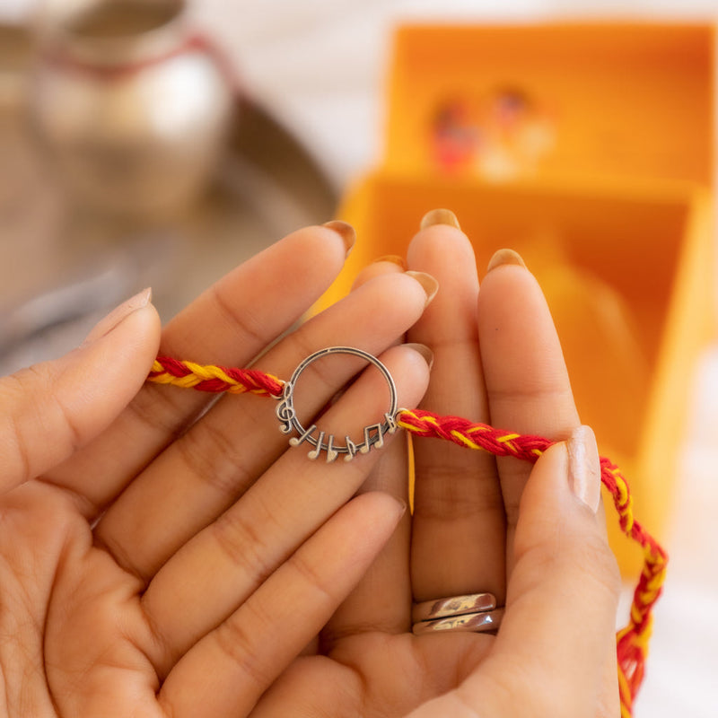 925 pure silver musical note motif rakhi