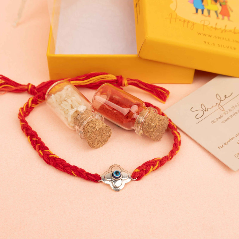 925 pure silver evil eye blossom rakhi, close-up