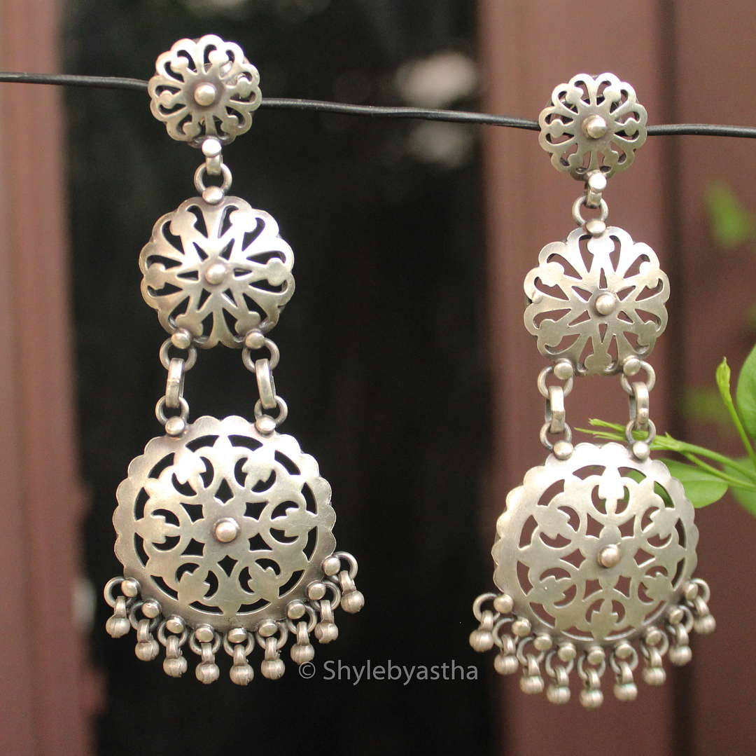 Anvaya Three Layered Carved Danglers