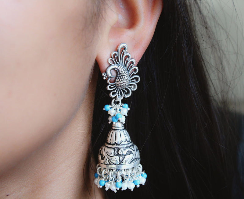 Anvaya Peacock Motif Embossed Jhumka