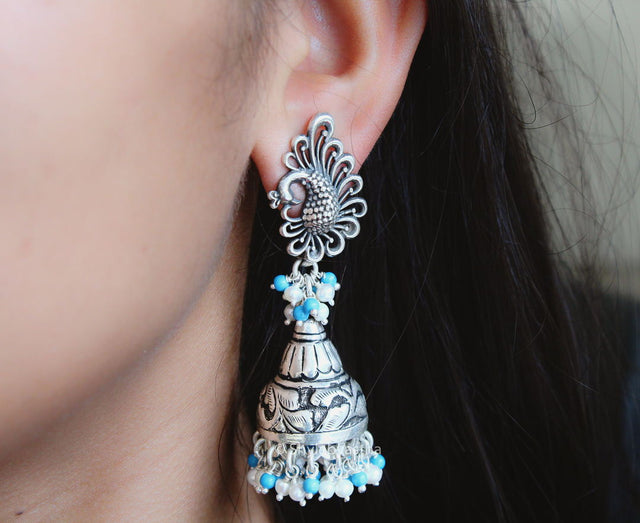 Anvaya Peacock Motif Embossed Jhumka