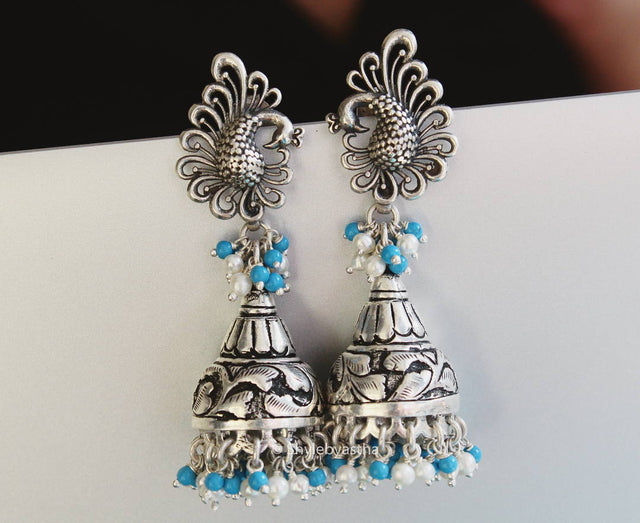 Anvaya Peacock Motif Embossed Jhumka