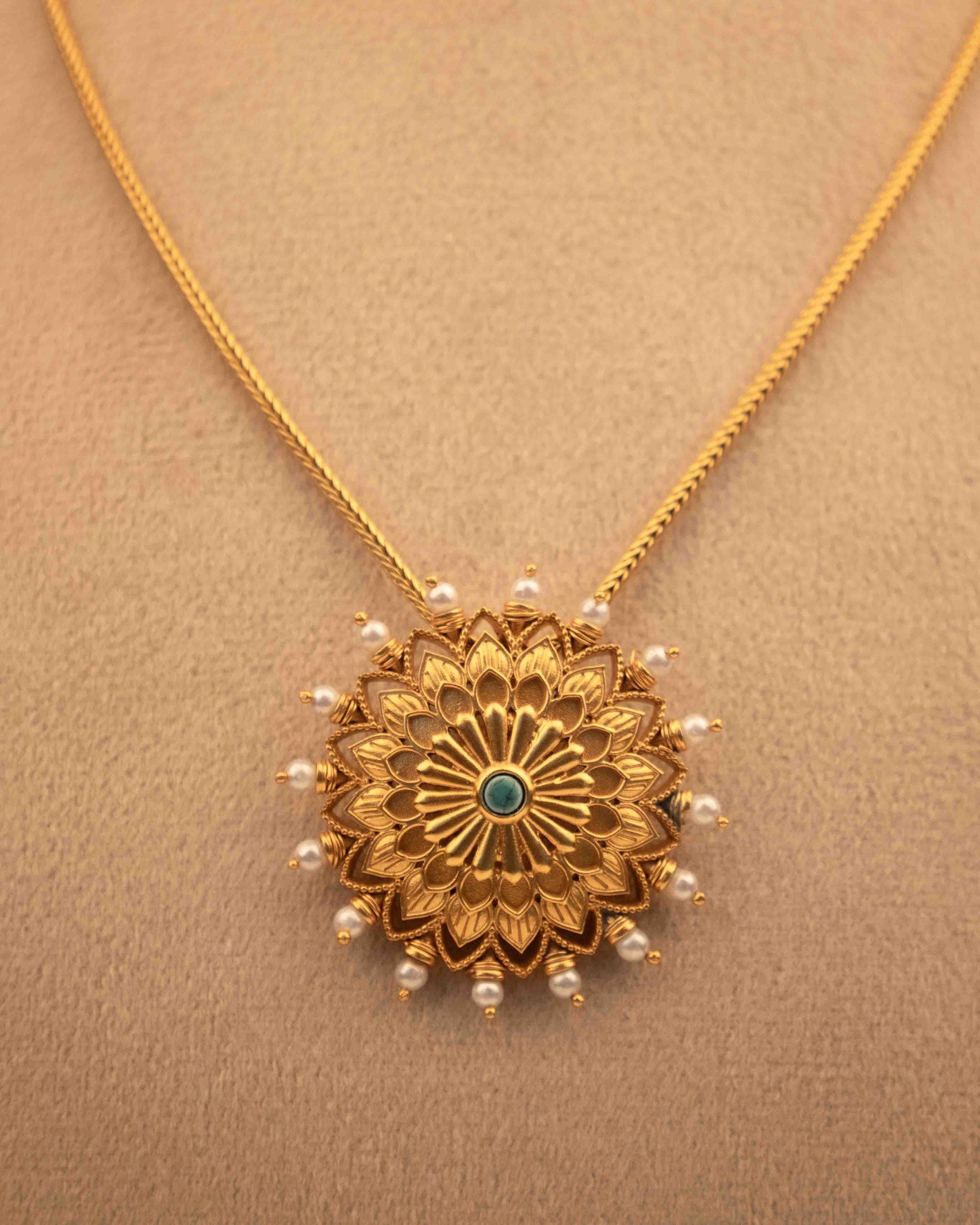 Anvaya Pearl Bordered Intricate Flower Gold Plated Pendant
