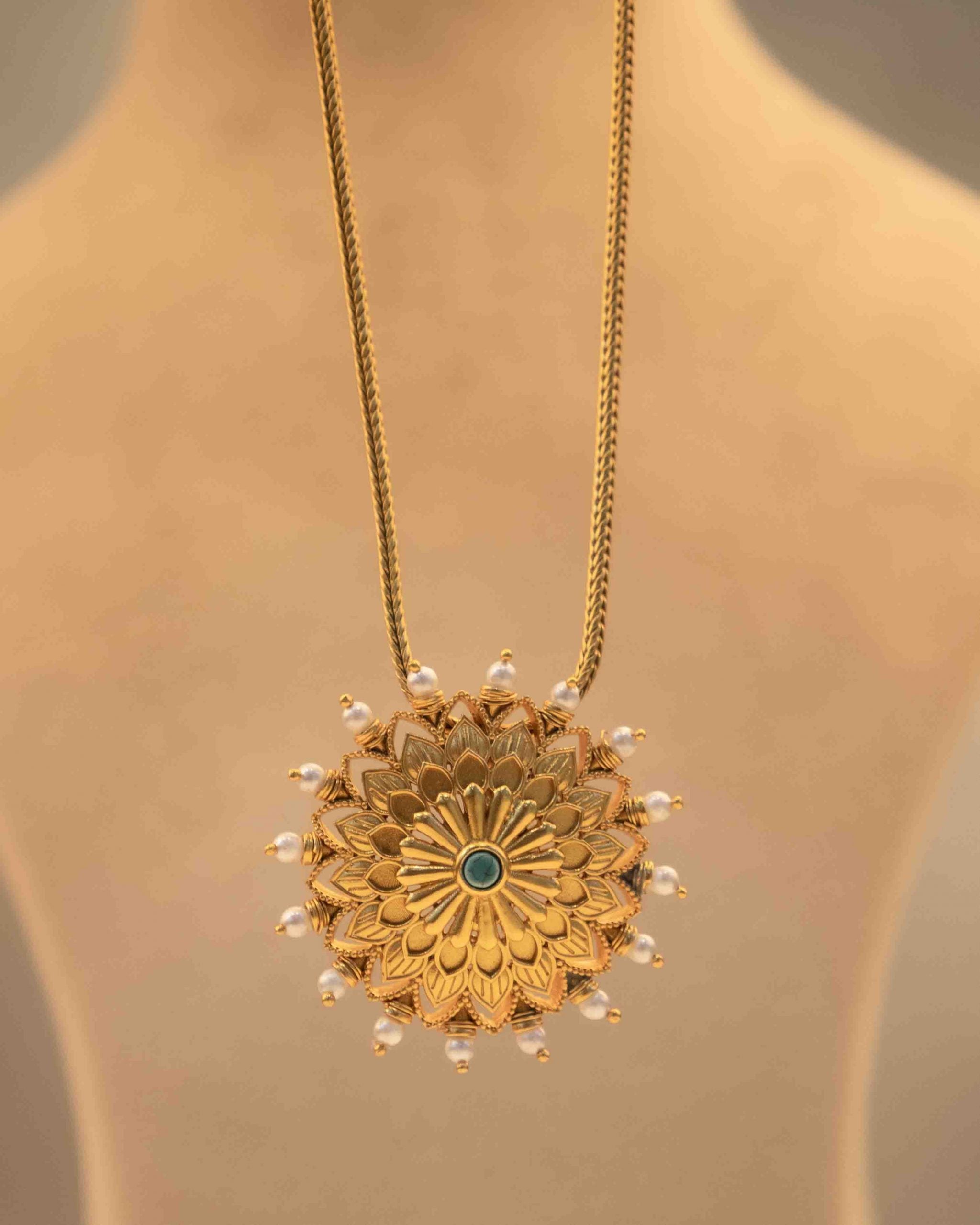Anvaya Pearl Bordered Intricate Flower Gold Plated Pendant