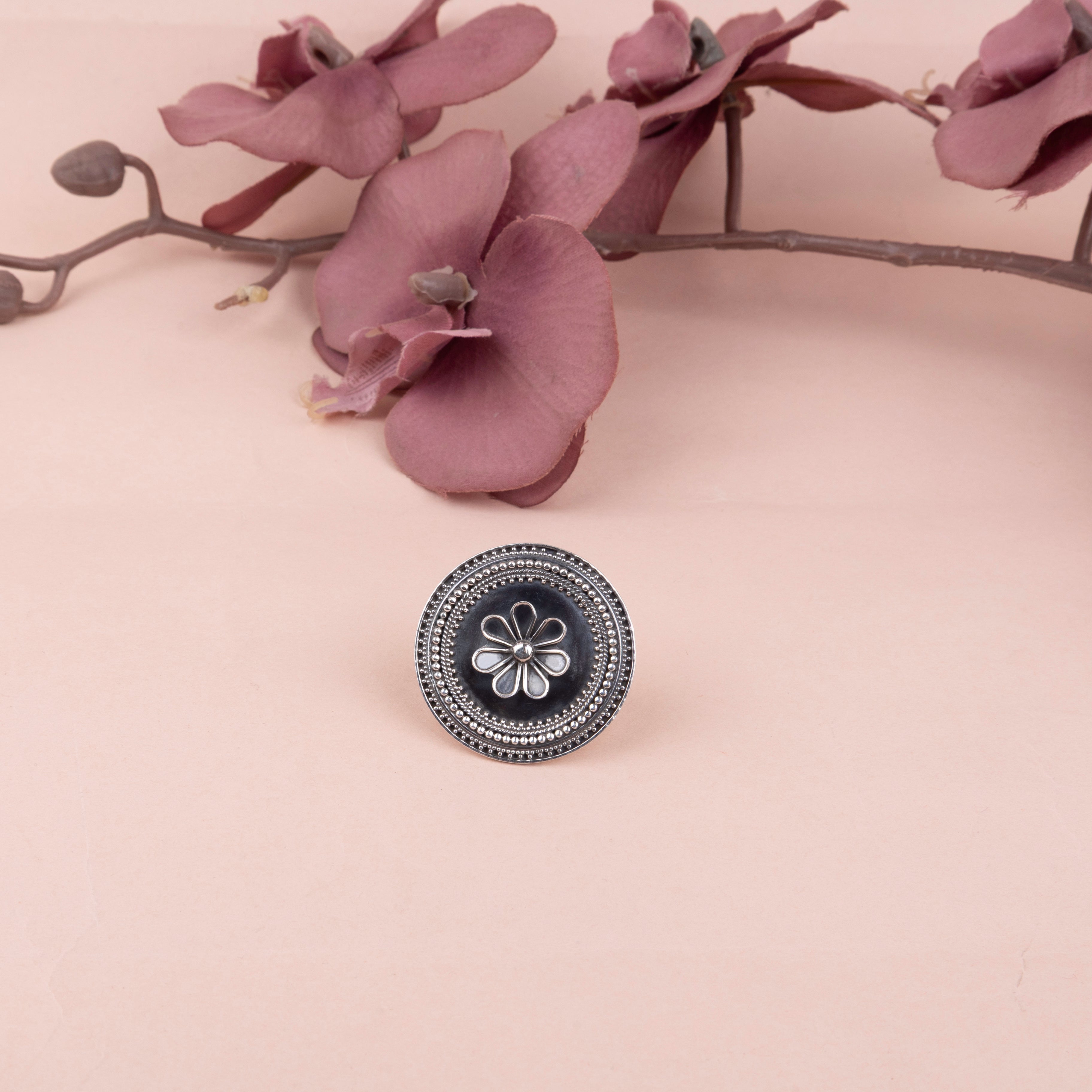 Anvaya sequence flower motif ring