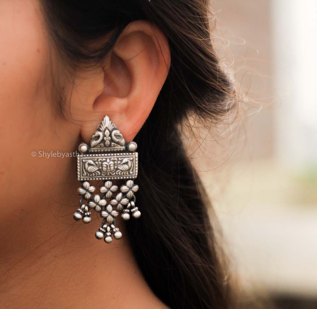 Mizoya Tribal Peacock Detailed Jali Earrings model