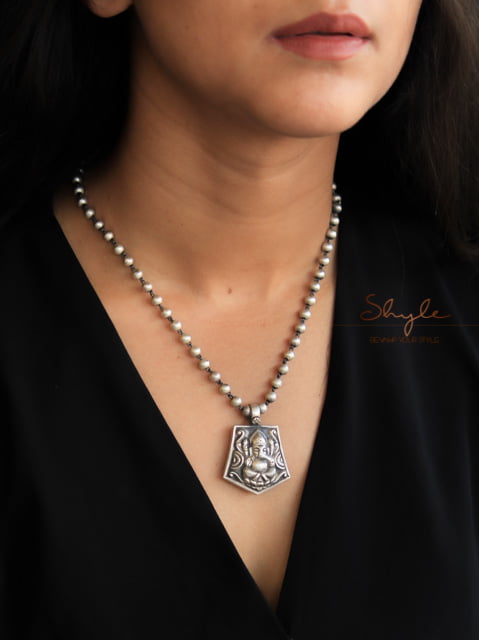 Moh Embossed Ganesha Ball Necklace