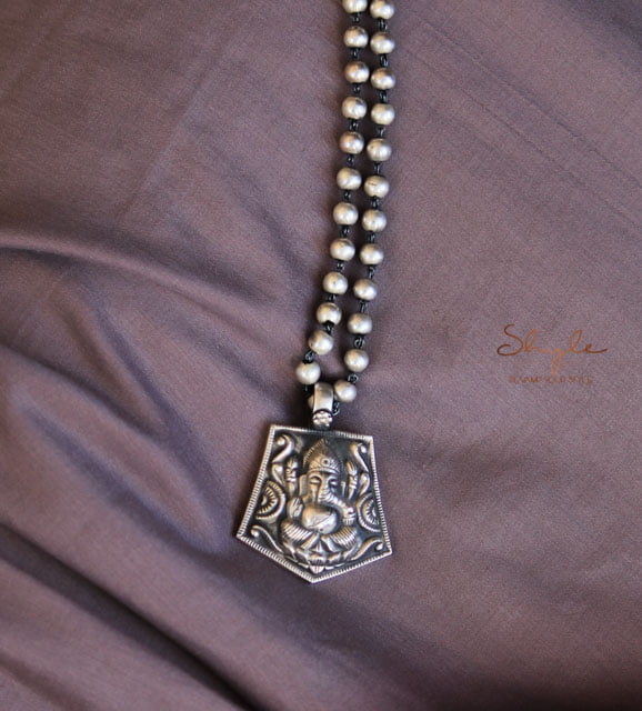 Moh Embossed Ganesha Ball Necklace