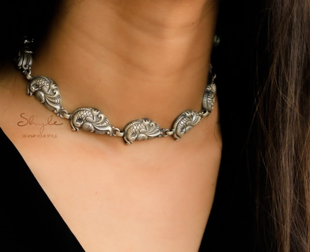 Adya Peacock Embossed Intricate Choker