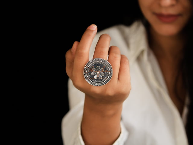 Anvaya sequence flower motif ring