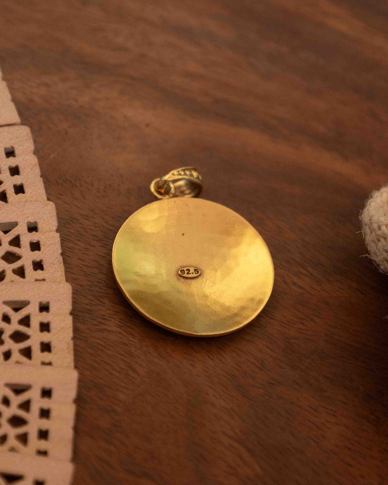 Gold-plated 925 silver Maha Mrityunjaya mantra Om pendant, close-up