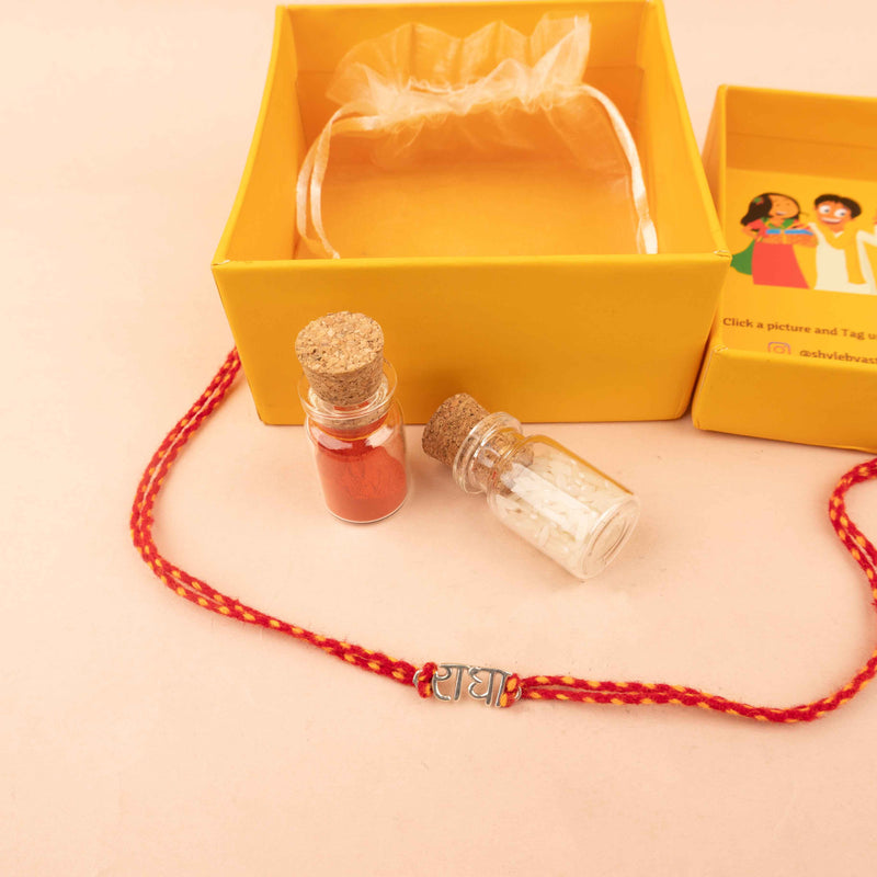925 pure silver Radha motif rakhi, side view
