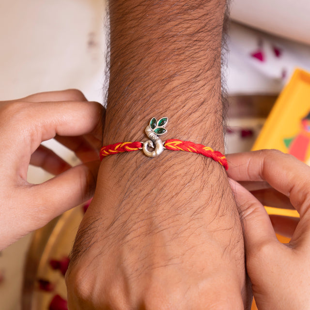 925 pure silver intricate peacock rakhi, detail view