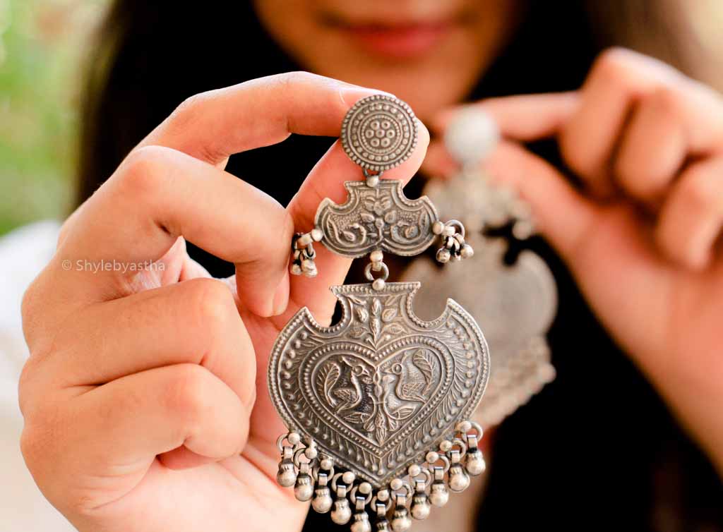 Anvaya Embossed Peacock Art Earrings model