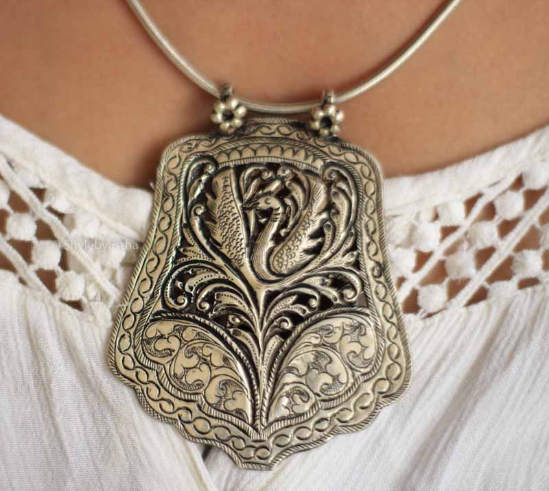 Adya Finely Carved Peacock Art Pendant