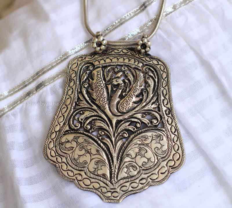 Adya Finely Carved Peacock Art Pendant