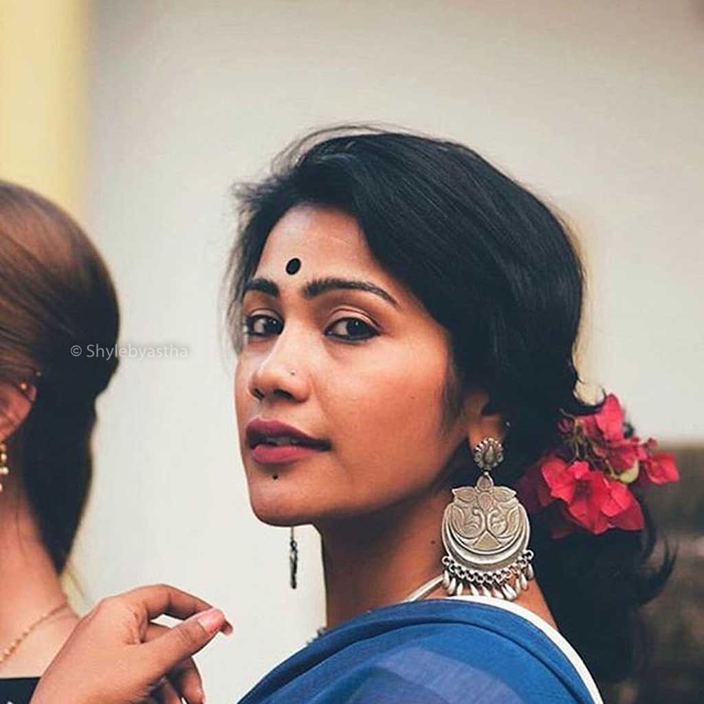 Anvaya Dual Peacock Embossed Classic Earring