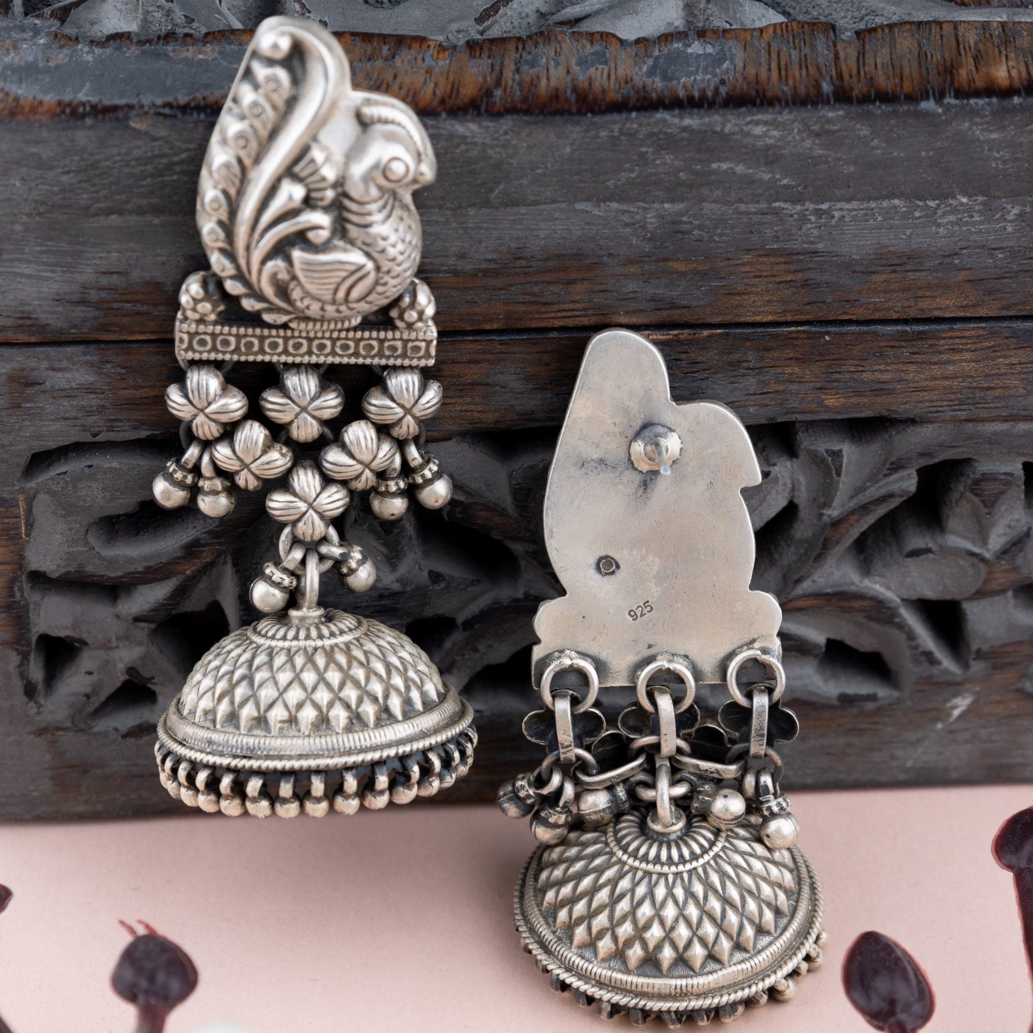 Tattva Peacock Jali Textured Grand Jhumka