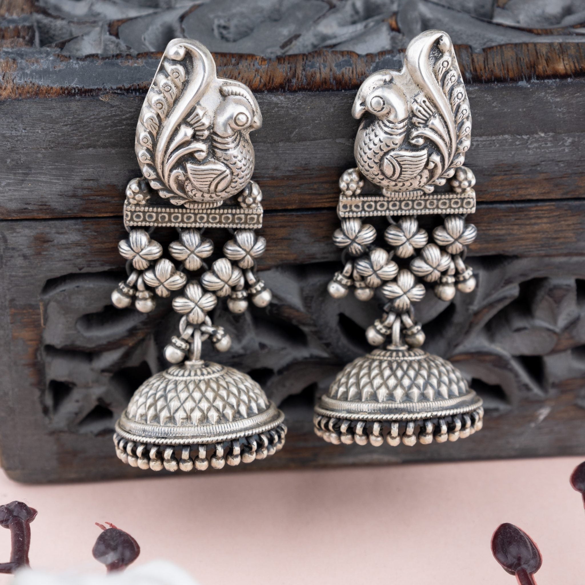 Tattva Peacock Jali Textured Grand Jhumka