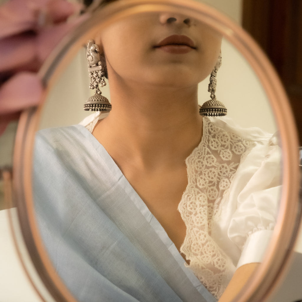 Tattva Peacock Jali Textured Grand Jhumka