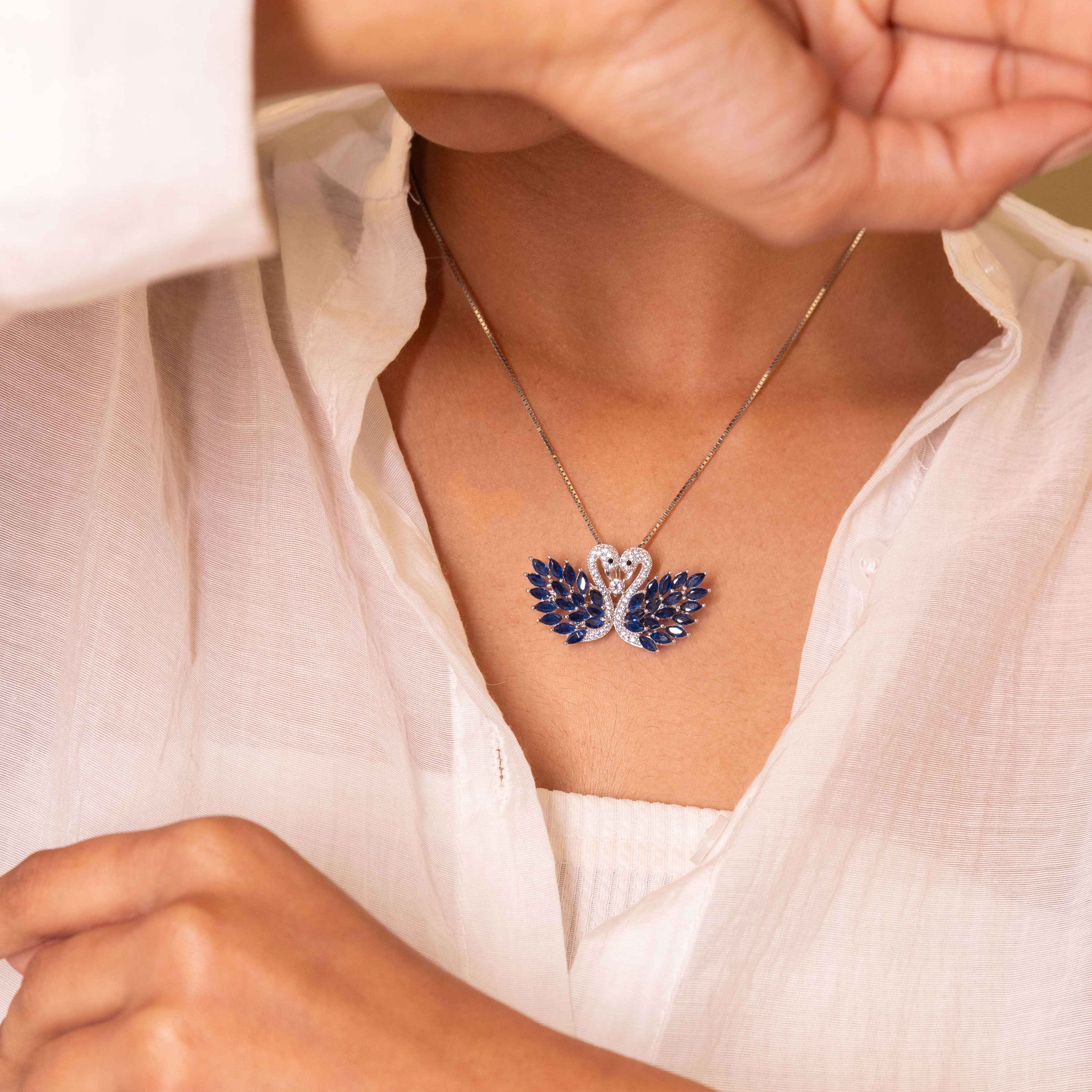 Adya Sculpted Swan Brooch Cum Pendant