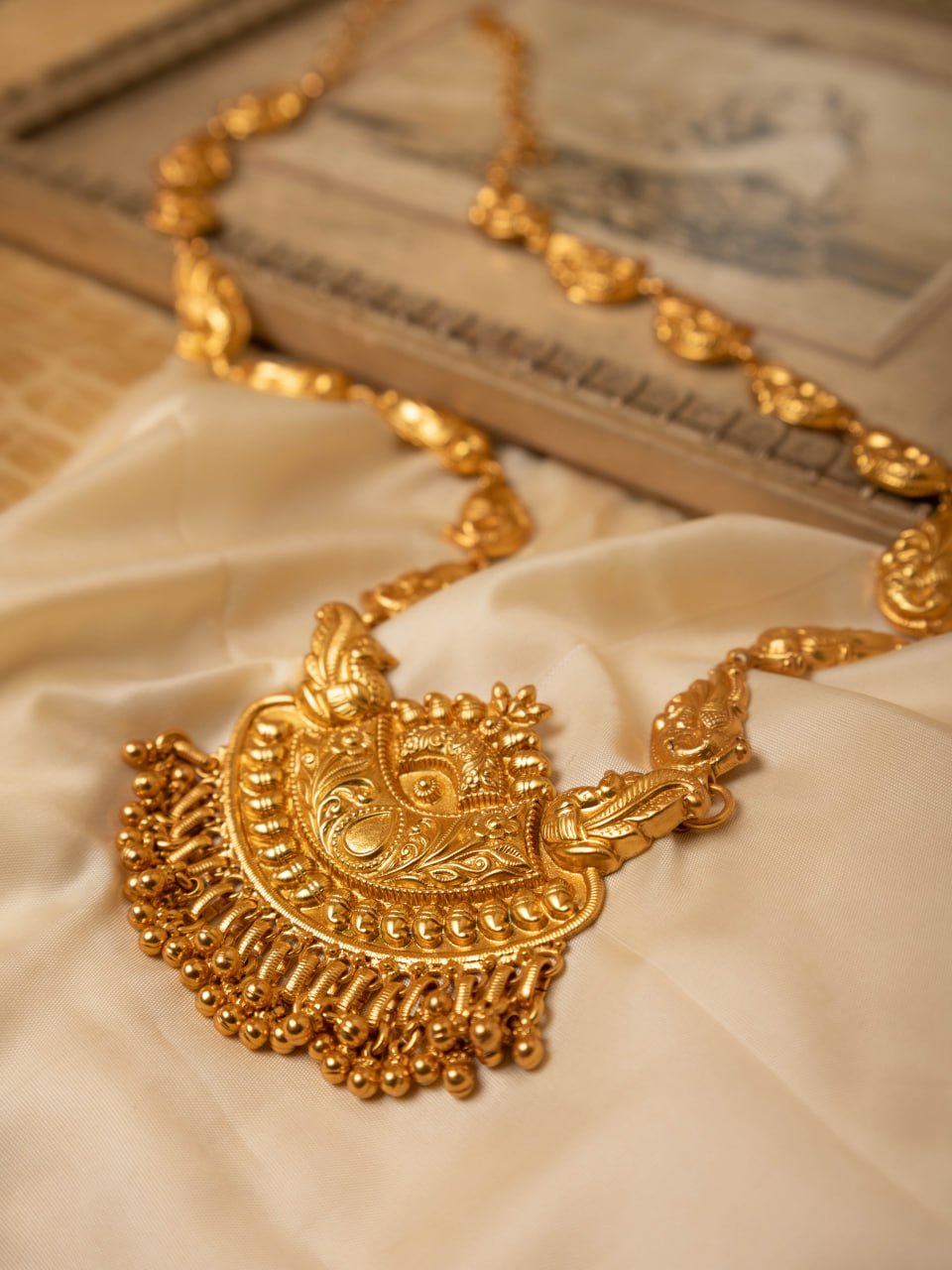 Anvaya Peacock Embossed Chandra Gold Tone Statement Necklace