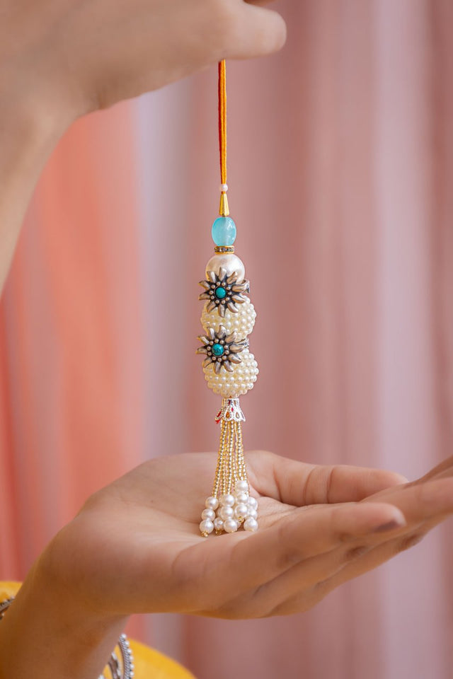 925 pure silver turquoise flower pearl drop lumba rakhi, alternate view