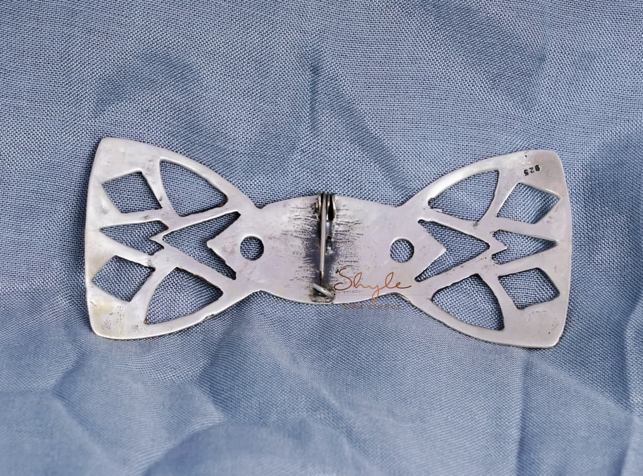 Moh Intricate Carved Bow Tie back