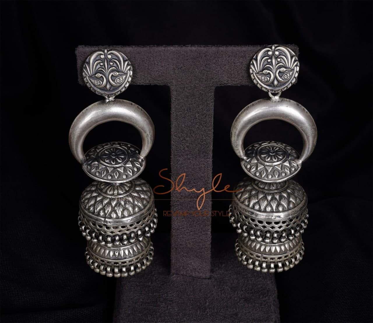 Tattva Peacock Motif Embossed Layered Statement Jhumka front