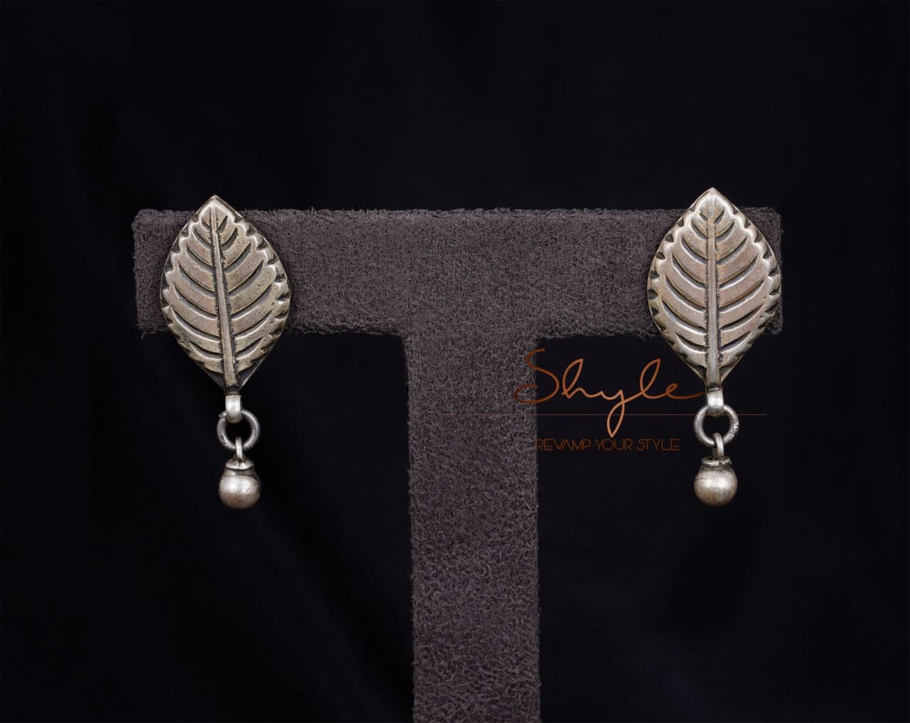 Adya intricate Leaf Earrings model front