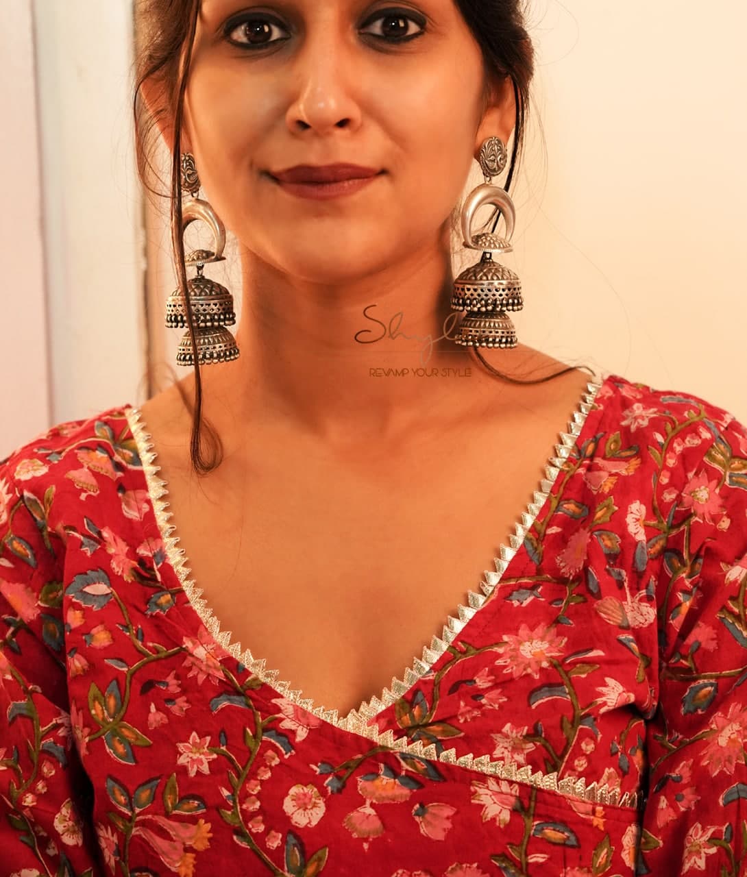 Tattva Peacock Motif Embossed Layered Statement Jhumka (2)