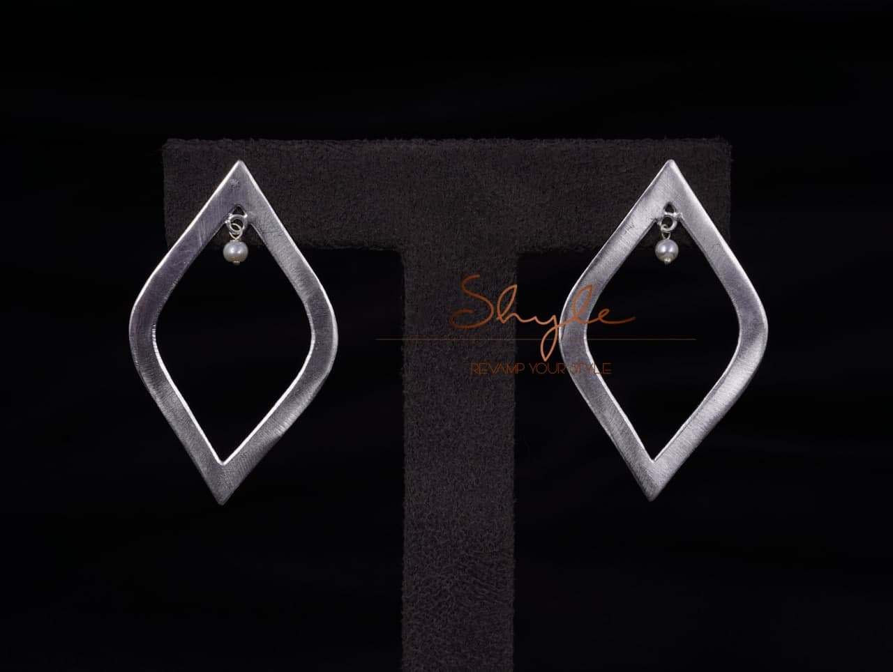 Qurbat Leaf Matte Earrings front