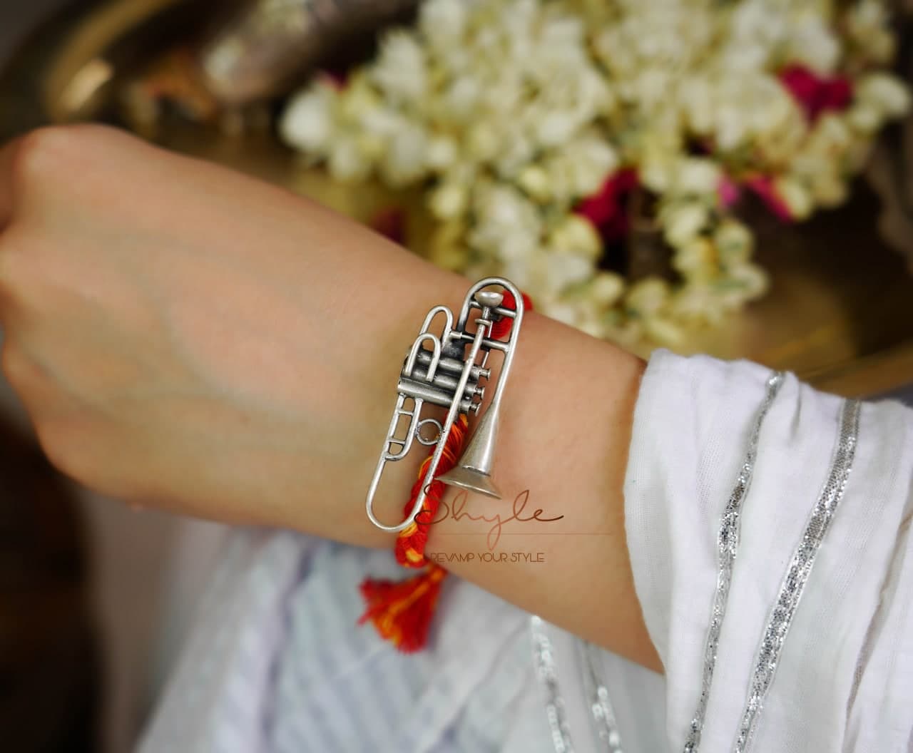 Anvaya Statement Trumphet Rakhi cum Brooch