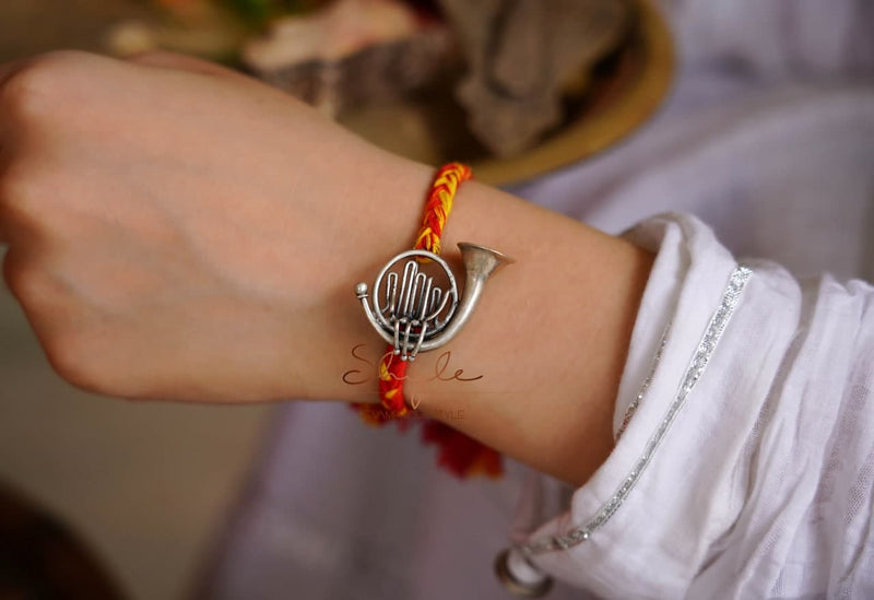 Anvaya Statement French Horn Rakhi cum Brooch