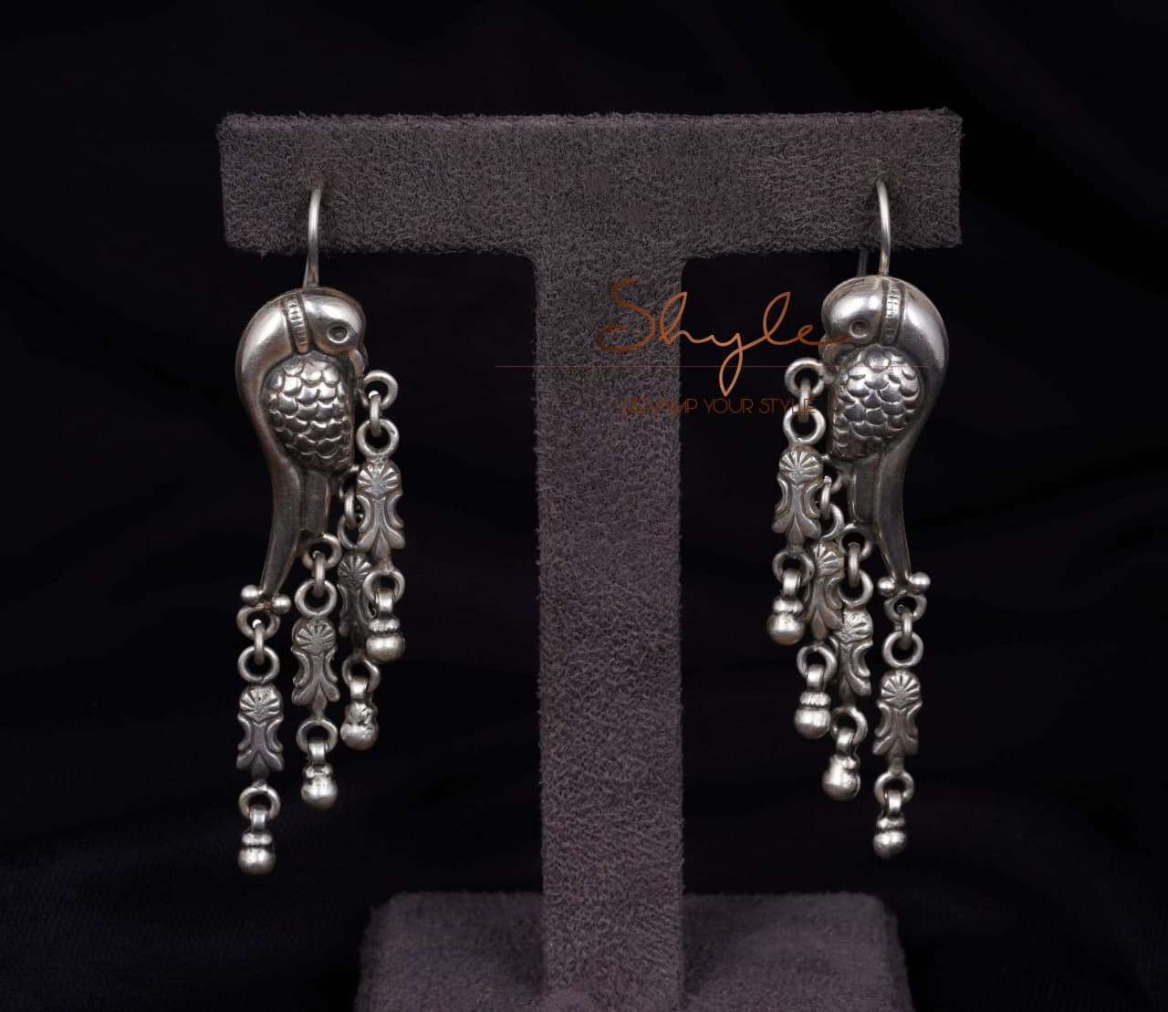 Adya Intricate Parrot Fish Hook Earrings front