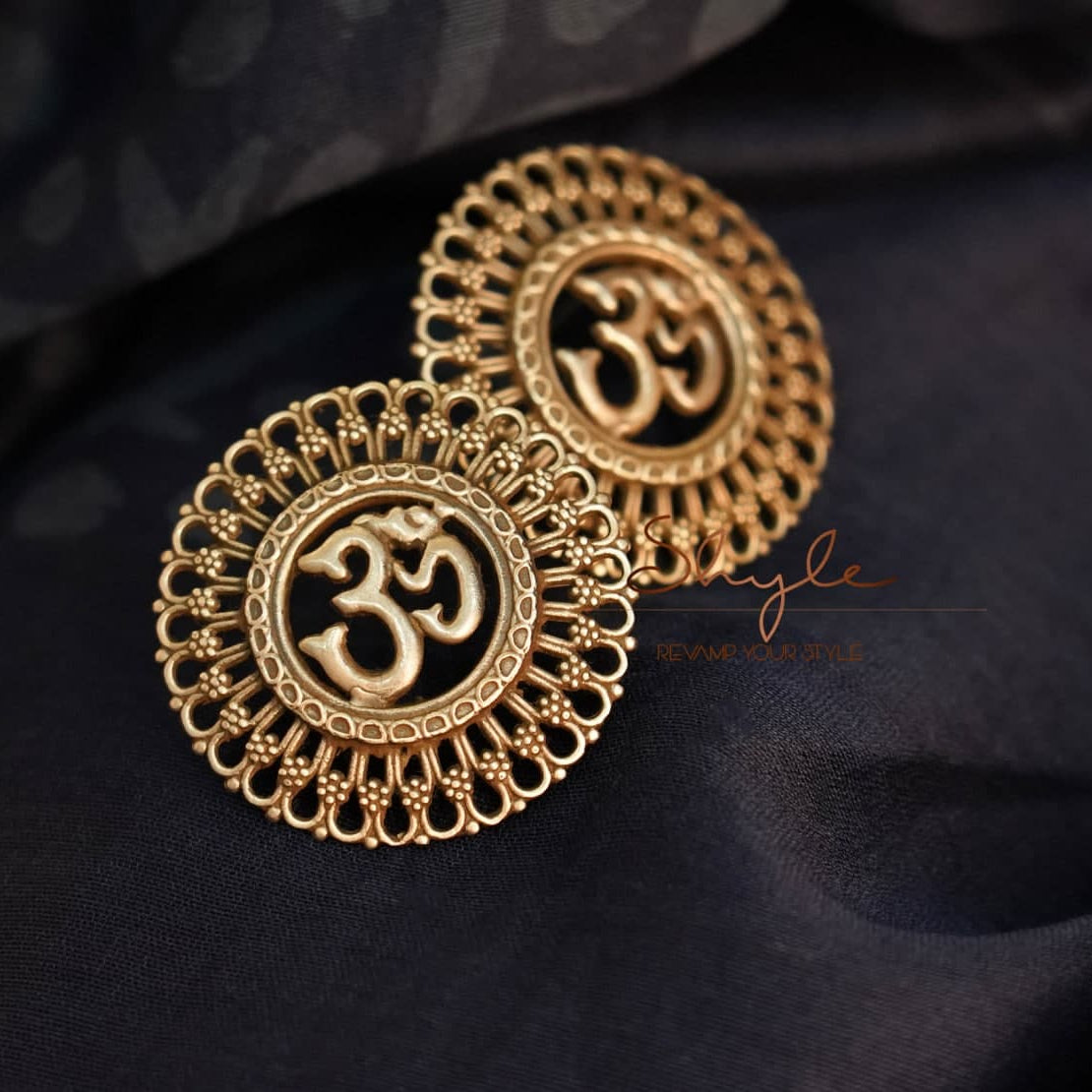 Moh Om Statement Earrings front