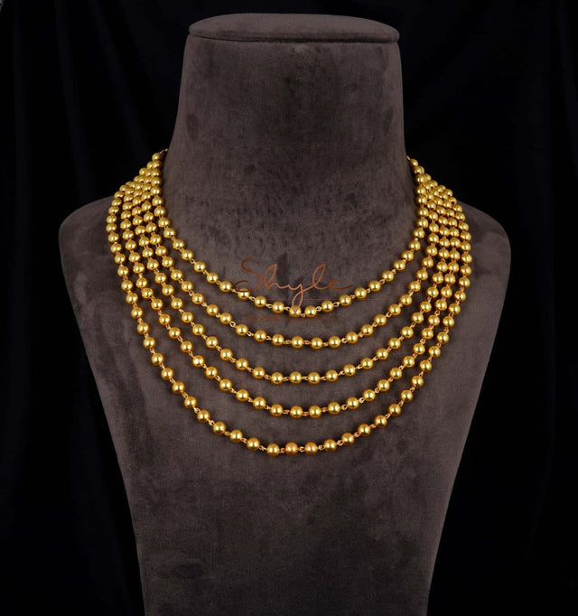 Tattva Tribal Motif Gold Layered Classic Ball Necklace