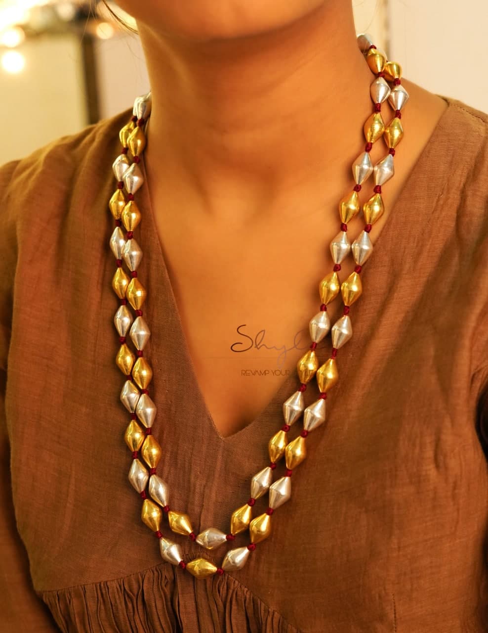 Tattva Dual Tone Dholki Necklace