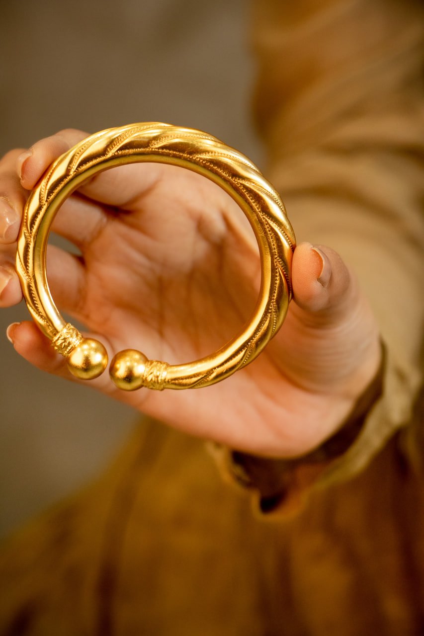 Anvaya Spiral Embossed Gold Tone Kada