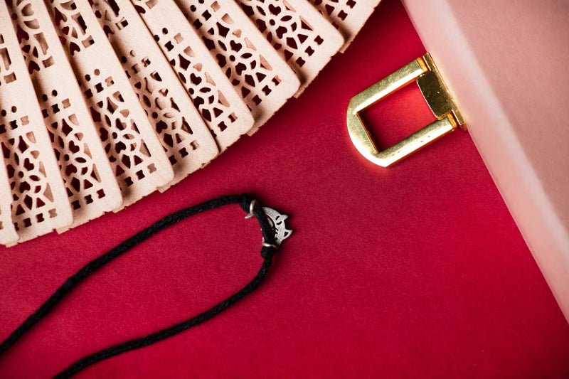 925 pure silver dolphin nazariya evil-eye charm, close-up
