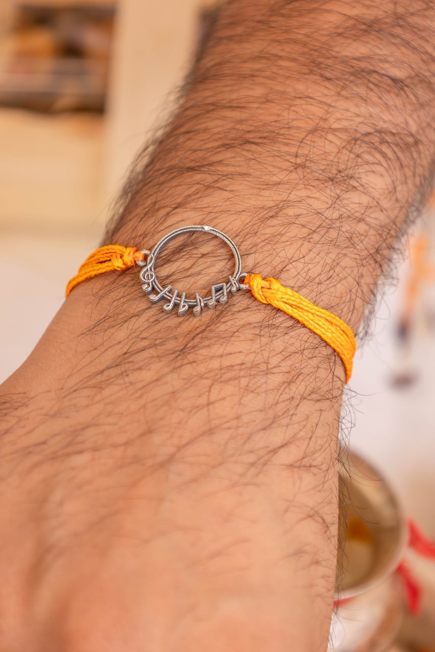 Adya Fine Musical Note Rakhi