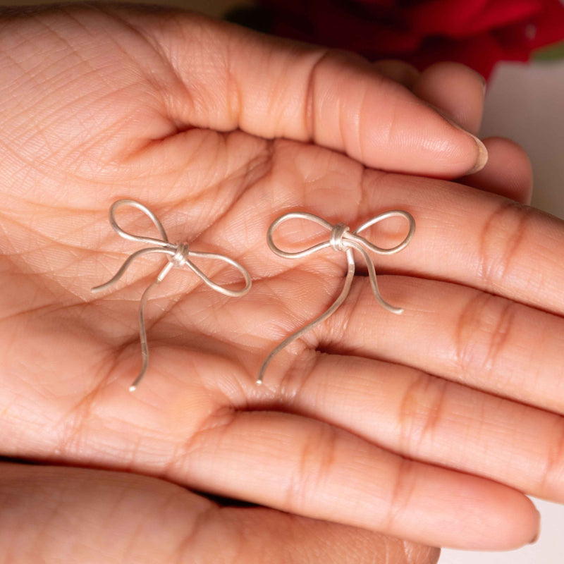 925 pure silver bow knot earrings, close-up