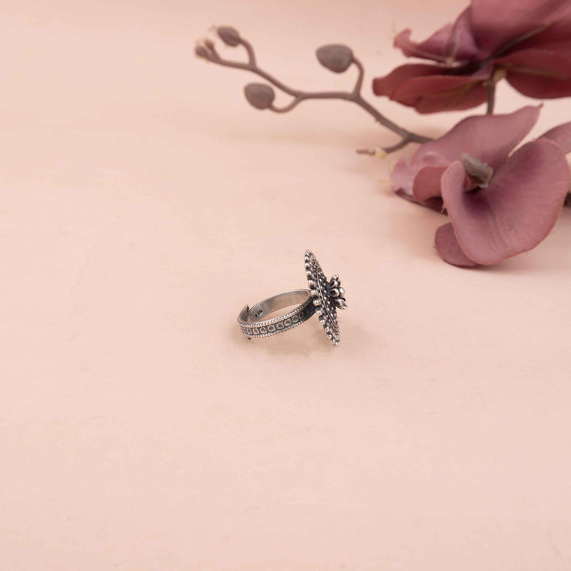Adya Intricate Jali Flower Embossed Ring