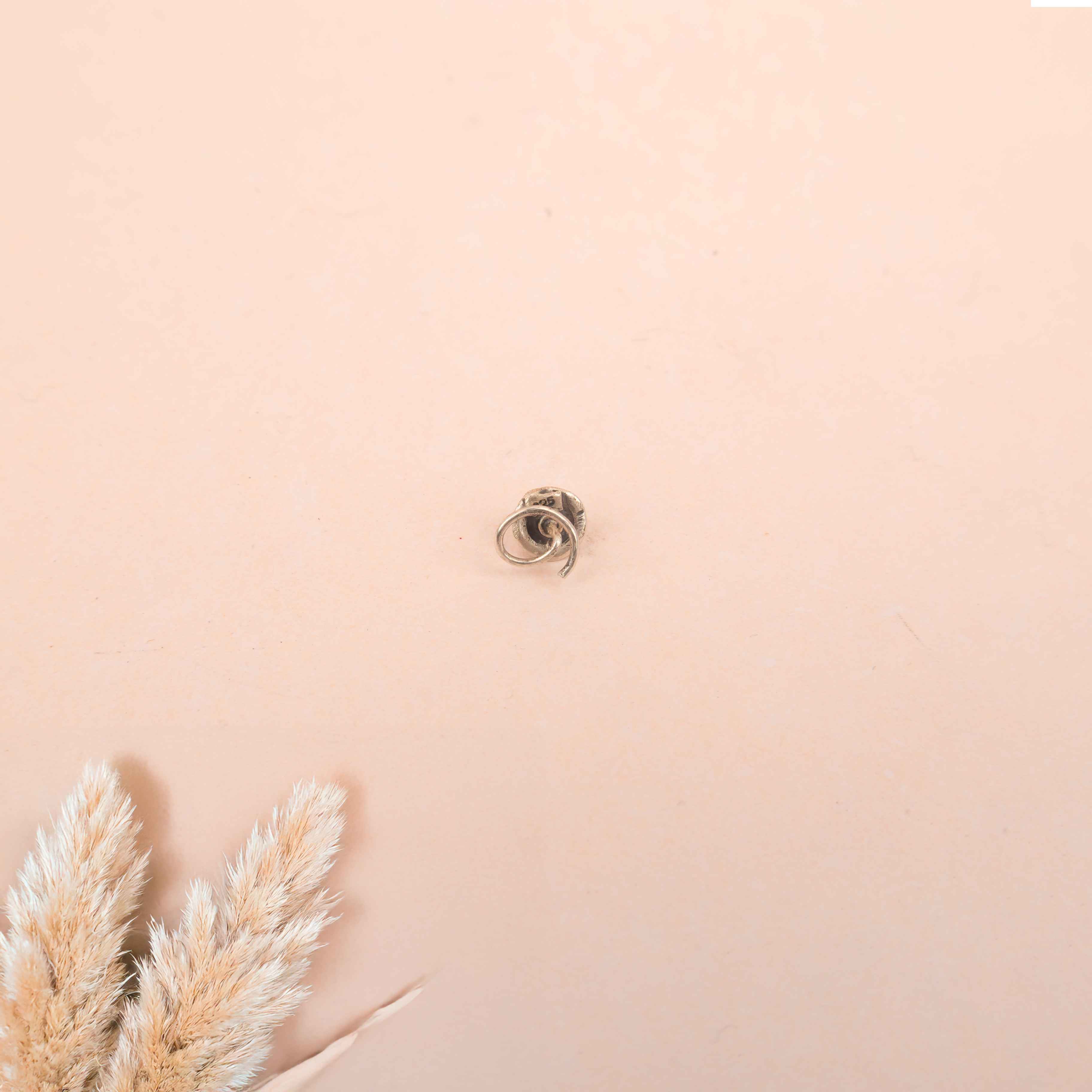 Adya Round Groove Pink Pierced Nose Ring