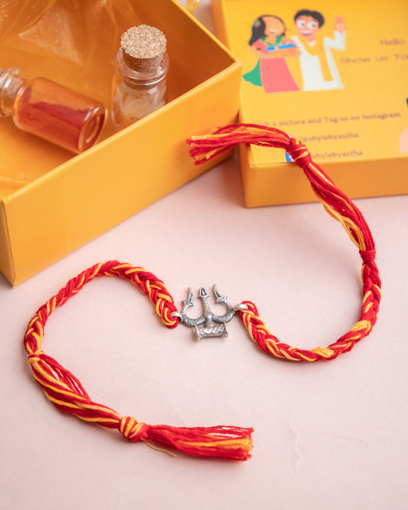 925 pure silver Shiva trishul rakhi, close-up
