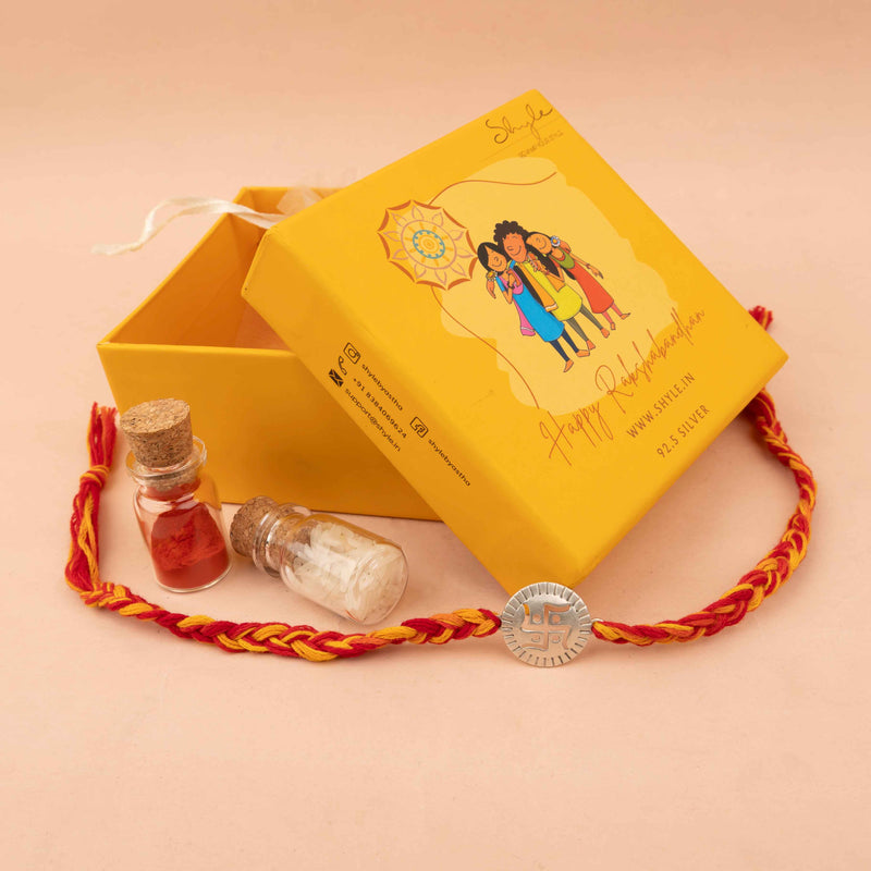 925 pure silver swastik shubh rakhi, close-up