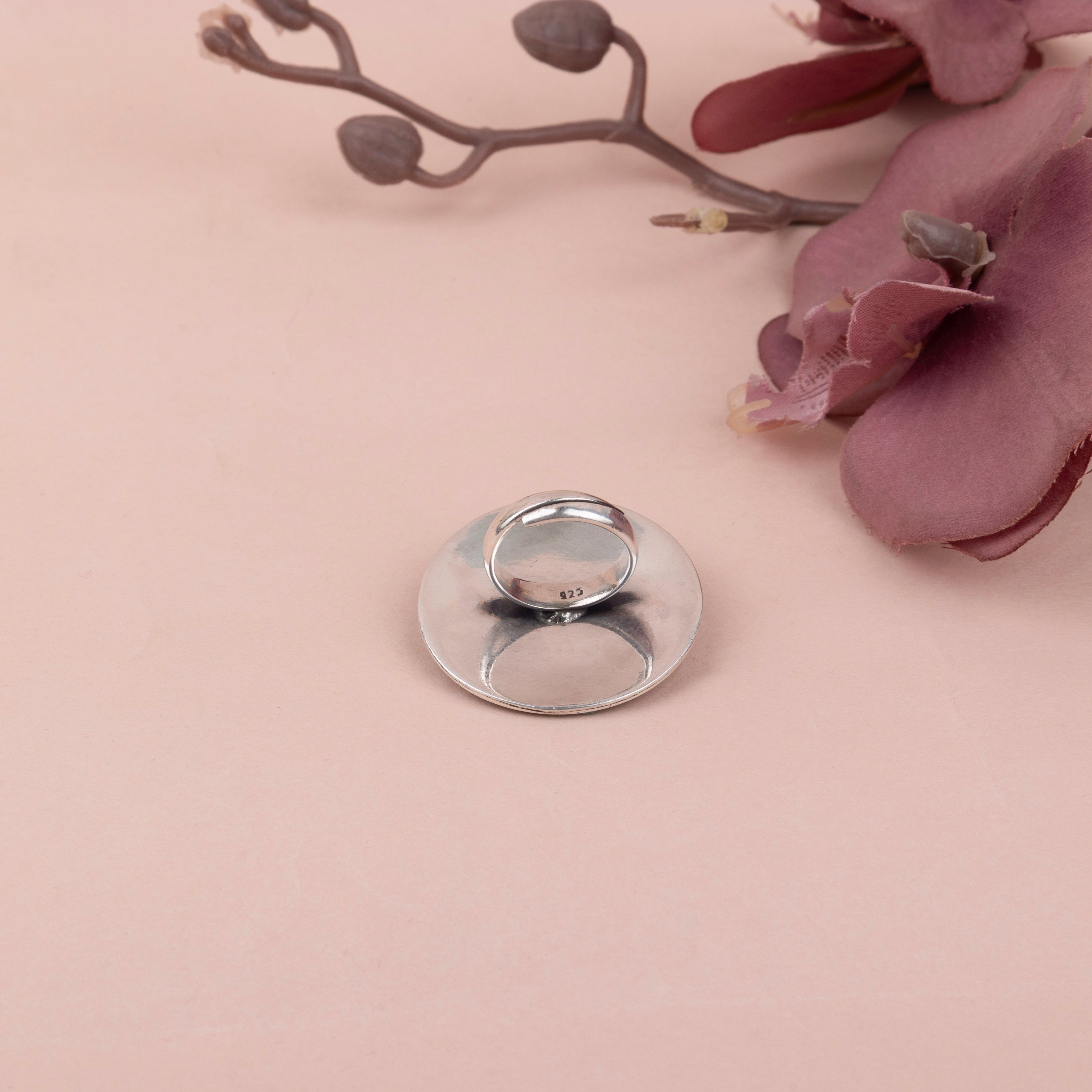 Anvaya sequence flower motif ring